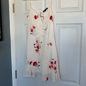 White dress with red flowers